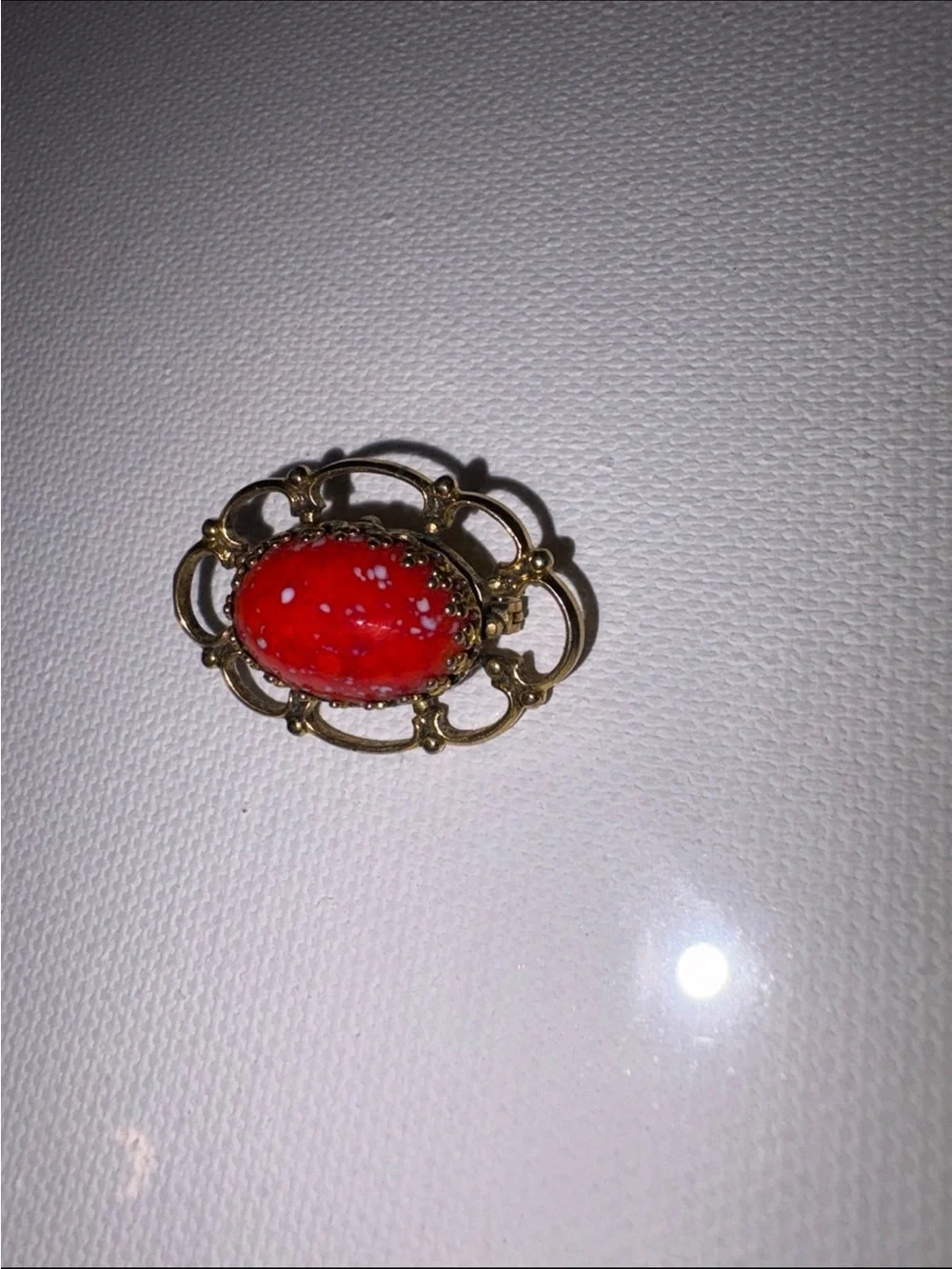 Vintage freirich gold tone orange speckled cabochon brooch